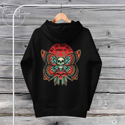 A black unisex hoodie with a graphic design featuring a skull, plants, and text on the front.