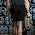 Mind Body Men's Recycled Athletic Shorts in four-way stretch microfiber with 91% recycled polyester and 9% spandex, featuring moisture-wicking, breathable fast-dry fabric, UPF50+ sun protection, elastic waistband with flat white drawstring, mesh side pockets, 6.5" inseam, designed for athletic performance and sustainable comfort.