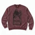 A washed burgundy crewneck sweatshirt featuring a large black graphic print of a skeleton in a suit holding a scythe, styled like a cigarette pack with the text 'KILLERS'.